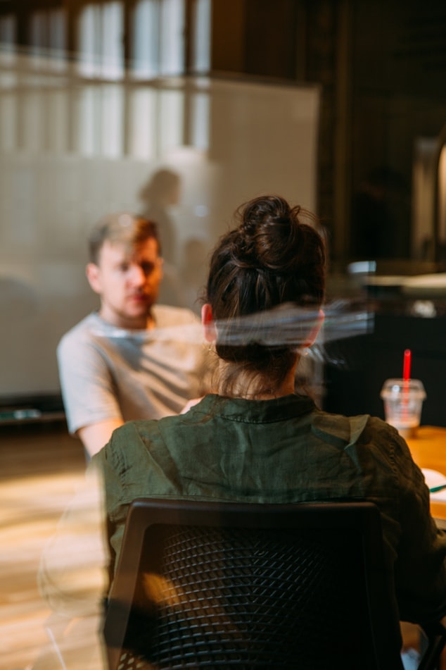 Two colleagues sitting at a desk