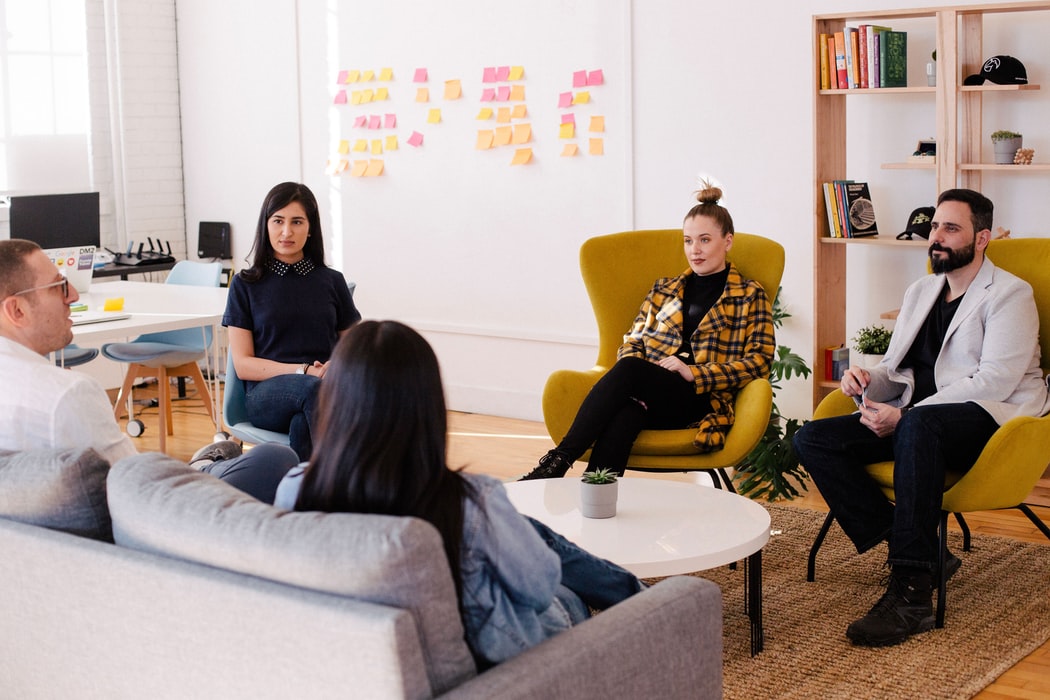 Group of people sitting in a circle